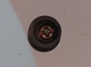 Nut and Screw in Back of Machine