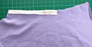 Shoulder Seam with Woven Selvedge Reinforcement