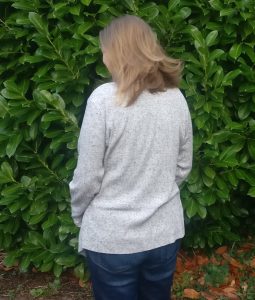 Back view of Swoon scarf neck cardigan